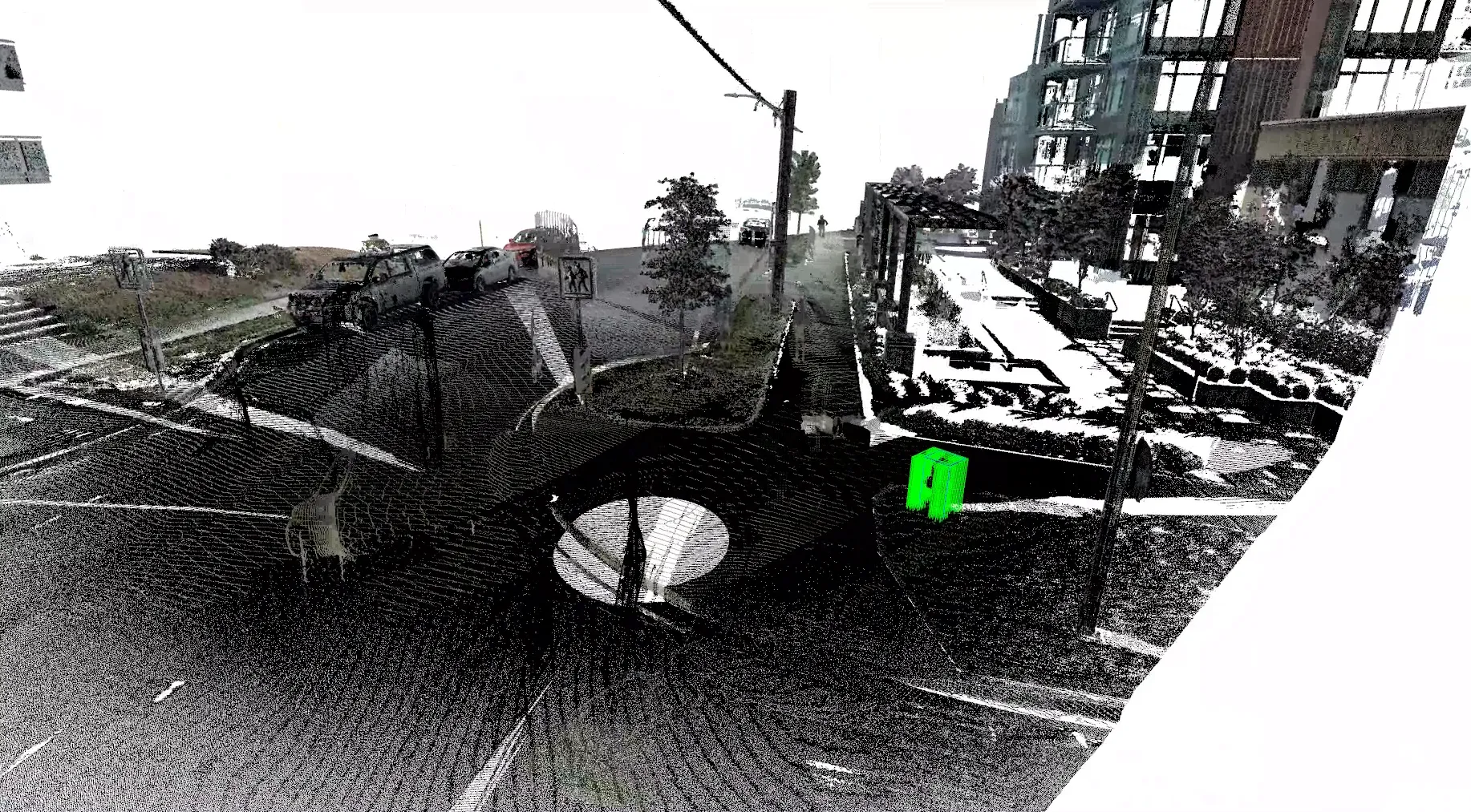 A dense 3D LiDAR point cloud reconstructing a street scene